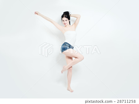 Young Beauty. Joyful Woman on Background 28711258