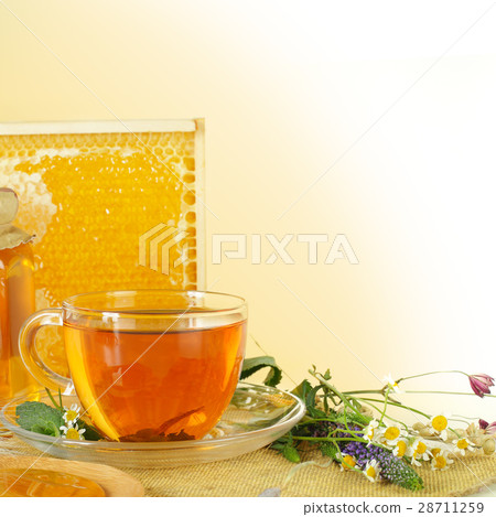 Honey and tea - healthy eating background Honey and tea - healthy eating background 28711259