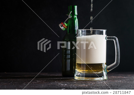 Glass mug of light beer Glass mug of light beer 28711847