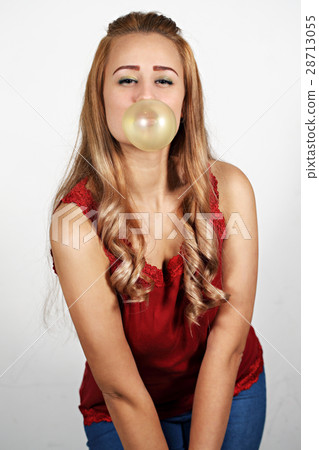 Woman making a big bubble 28713055