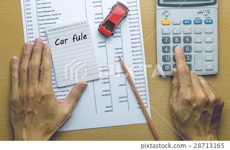 Man Planning Car fule expenses 28713165