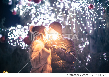 Couple with sparklers 28714373
