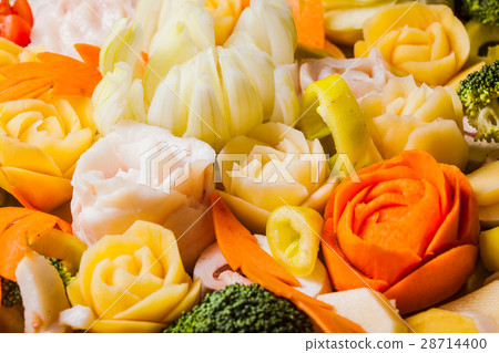 Carved vegetables for baking 28714400