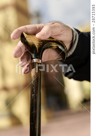 old man with a walking stick 28715393