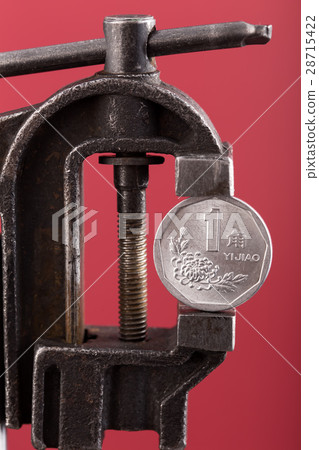 Chinese yuan coin in old vise Chinese yuan coin in old vise 28715422