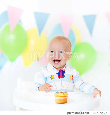 Little baby boy celebrating first birthday 28715423