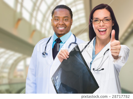 Female and Male Caucasian and African American Doctors in Hospit 28717782