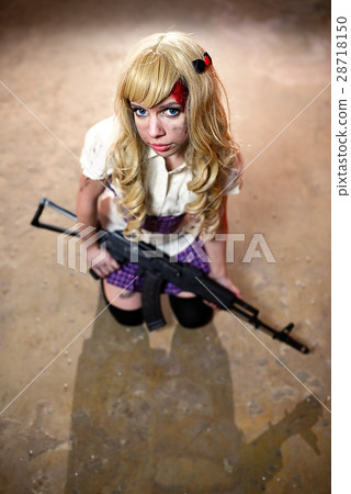 Japanese style cute schoolgirl holding mashingun Japanese style cute schoolgirl holding mashingun 28718150
