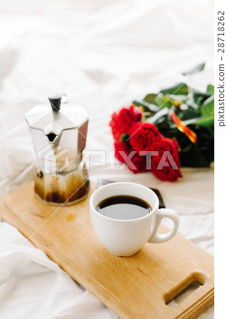 A cup of coffee, coffee on the wooden Boards A cup of coffee, coffee on the wooden Boards 28718262