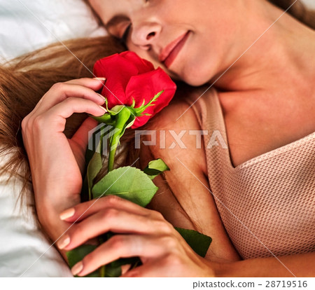 Woman sleeping in bed. Girl lying on bed with Woman sleeping in bed. Girl lying on bed with 28719516
