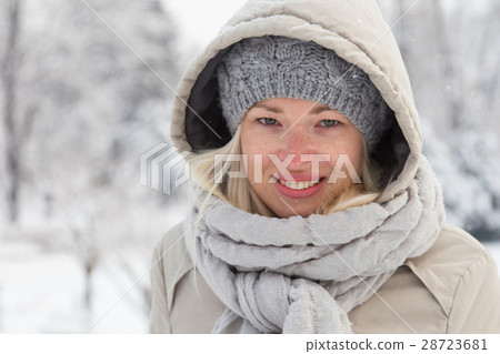 Portrait of lady outdoor in snow in cold winter Portrait of lady outdoor in snow in cold winter 28723681