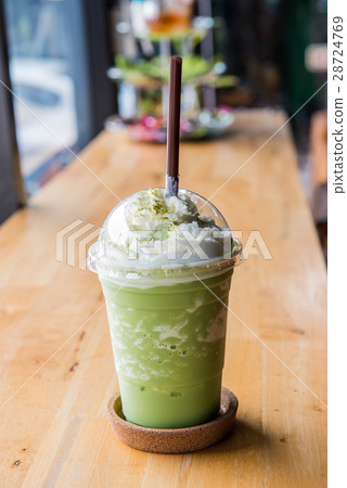 green tea frappe and blended on table 28724769