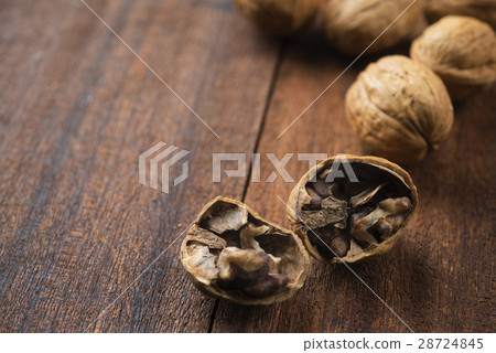 Cracked walnuts shell Cracked walnuts shell 28724845