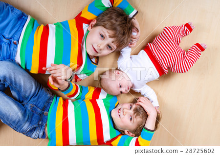 Two happy little preschool kids boys with newborn Two happy little preschool kids boys with newborn 28725602