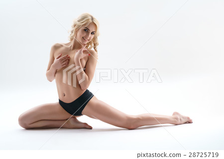 Sporty blonde topless posing in split studio shot Sporty blonde topless posing in split studio shot 28725719