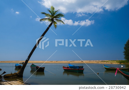 Boat at beach and blue sky 28730942