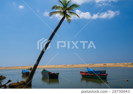 Boat at beach and blue sky Boat at beach and blue sky 28730943