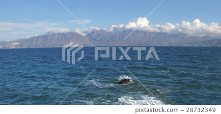 Seascape with mountains and clouds 28732349