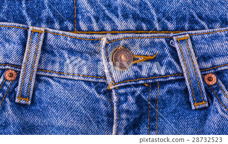 Close up of the LEVI'S button on the blue jeans 28732523