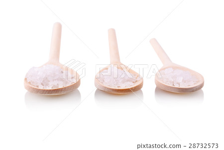 wooden spoon with a white salt bath wooden spoon with a white salt bath 28732573
