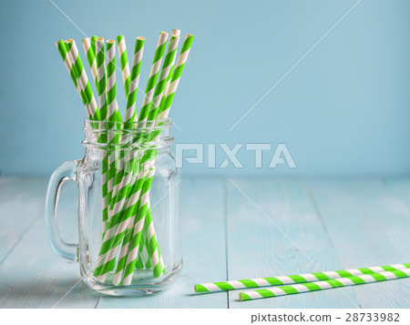 Mason jars with yellow paper straws and cap. Ideal Mason jars with yellow paper straws and cap. Ideal 28733982