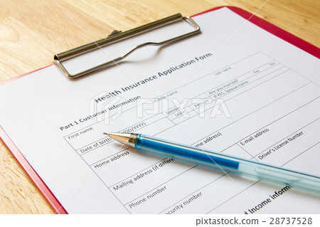 Blank health insurance application form with pen Blank health insurance application form with pen 28737528