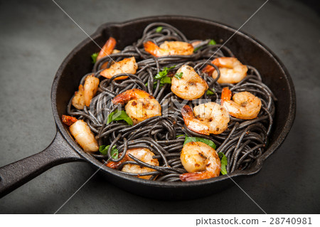 Black pasta with shrimps 28740981