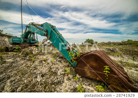 heavy, old and broken excavator 28741929
