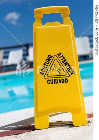 Slippery floor surface attention symbol Slippery floor surface attention symbol 28742968