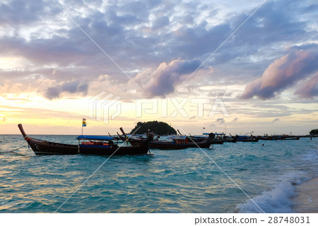Colorful dawn over the sea with boat. 28748031