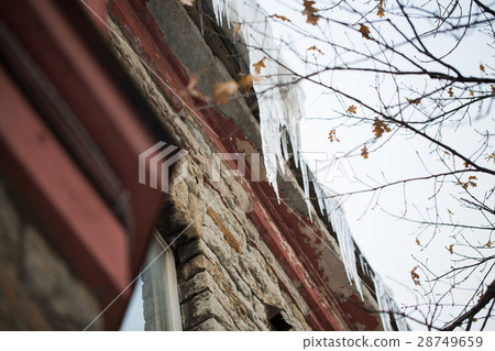 icicles hanging from building roof icicles hanging from building roof 28749659