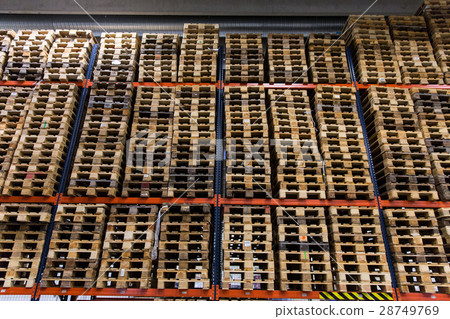 wooden cargo pallets storing at warehouse shelves 28749769