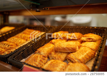 close up of pies at bakery or grocery store close up of pies at bakery or grocery store 28750095