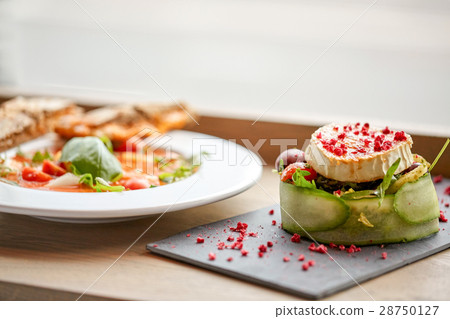 goat cheese salad and gazpacho soup at restaurant 28750127