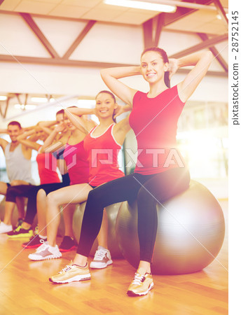 group of people working out in pilates class 28752145