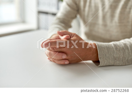 close up of senior man hands on table close up of senior man hands on table 28752268