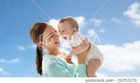 happy young mother with little baby over blue sky happy young mother with little baby over blue sky 28752270