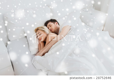 happy couple sleeping in bed at home happy couple sleeping in bed at home 28752646