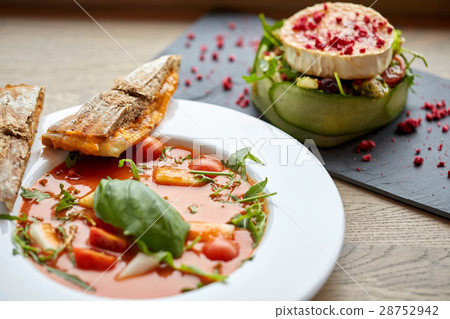 goat cheese salad and gazpacho soup at restaurant 28752942