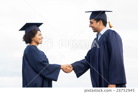 happy students or bachelors greeting each other happy students or bachelors greeting each other 28752945