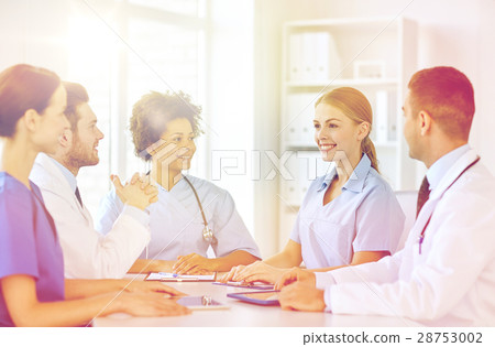 group of happy doctors meeting at hospital office group of happy doctors meeting at hospital office 28753002