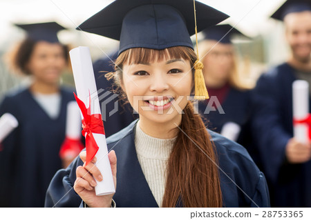 close up of happy student or bachelor with diploma close up of happy student or bachelor with diploma 28753365