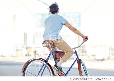 hipster man riding fixed gear bike hipster man riding fixed gear bike 28753597