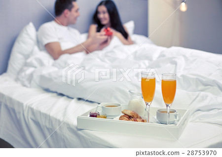 close up of man giving woman engagement ring close up of man giving woman engagement ring 28753970