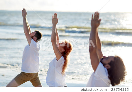 group of people making yoga exercises on beach group of people making yoga exercises on beach 28754315