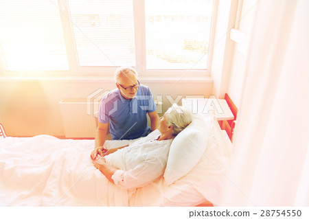 senior couple meeting at hospital ward senior couple meeting at hospital ward 28754550