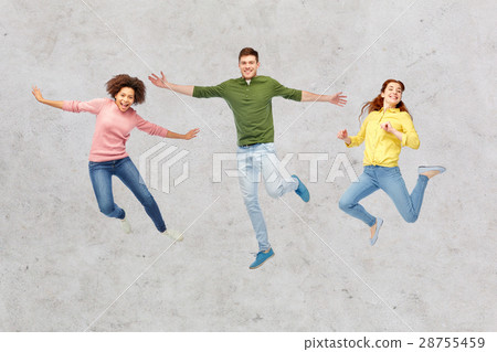 smiling young man jumping in air 28755459