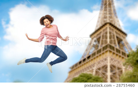 happy african american woman jumping over white 28755460