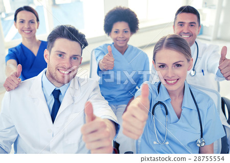 group of happy doctors on seminar at hospital group of happy doctors on seminar at hospital 28755554