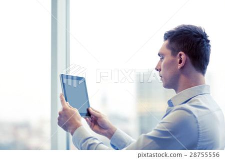 businessman with tablet pc in office businessman with tablet pc in office 28755556